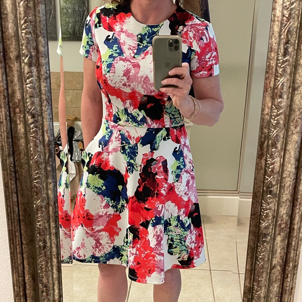 Colorful, flattering, comfortable, doesn’t lose shape, non-iron/steam dress
